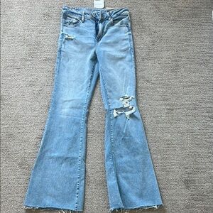 Women's Distressed Blue Jeans